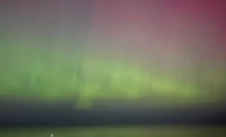 The northern lights, or aurora borealis, gave a surprise visit over New York and New Jersey overnight due to what forecasters predict a potentially severe geomagnetic storm.